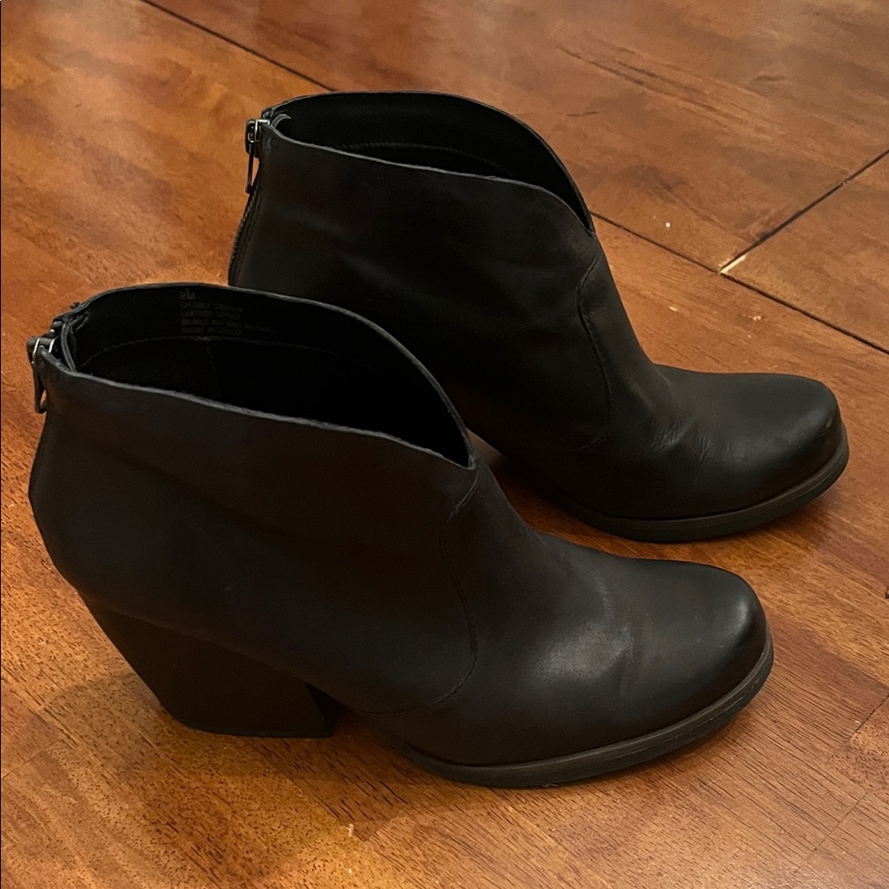 Elegant Black Leather Ankle Boots by Korks